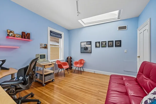 a workspace with wooden floor