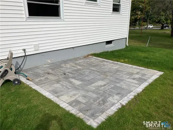 a view of a backyard with a garden
