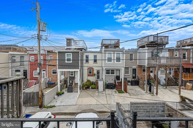 a view of dinning table and chairs in patio
