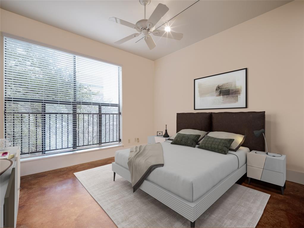 911 Keith Lane, Unit 12 Austin, TX 78705 - Photo 12 of 16 a bedroom with a bed and a large window