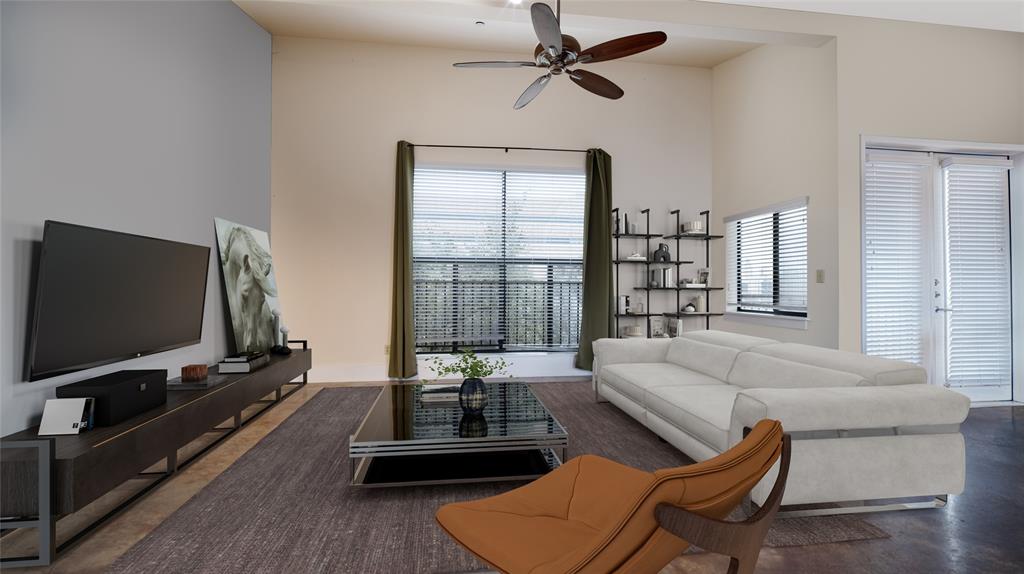 911 Keith Lane, Unit 12 Austin, TX 78705 - Photo 4 of 16 a living room with furniture and a flat screen tv