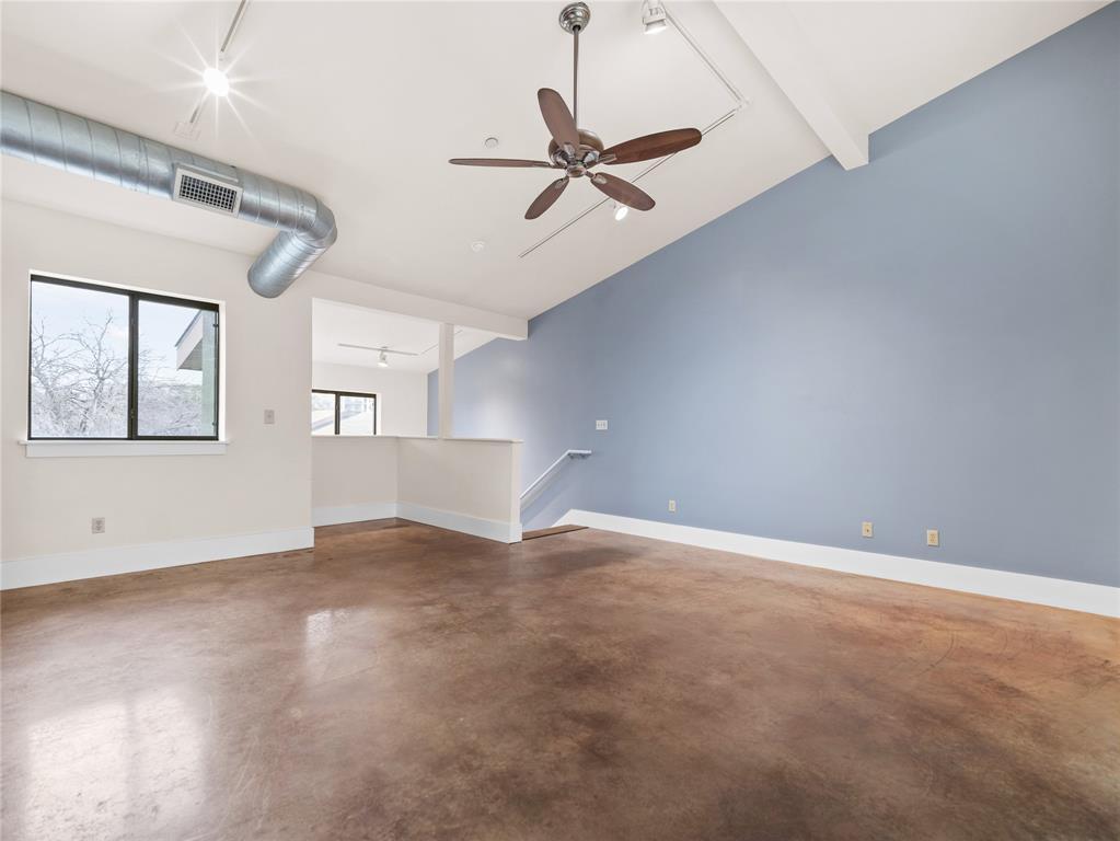 911 Keith Lane, Unit 12 Austin, TX 78705 - Photo 5 of 16 a view of an empty room with a window