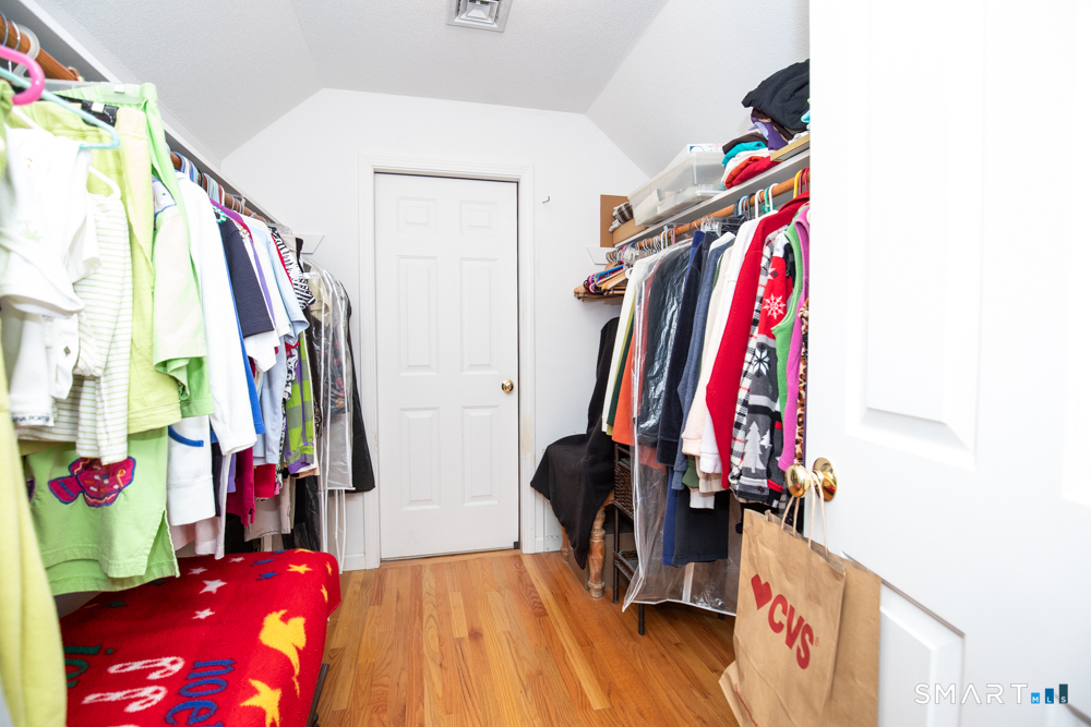 735 Cook Hill Road Cheshire, CT 06410 - Photo 23 of 35 Two of Two walk-in closets in primary bedroom.