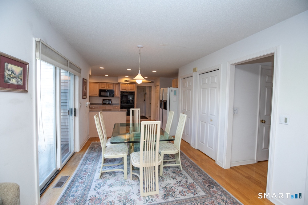 735 Cook Hill Road Cheshire, CT 06410 - Photo 9 of 35 Featuring slider and two pantry closets.