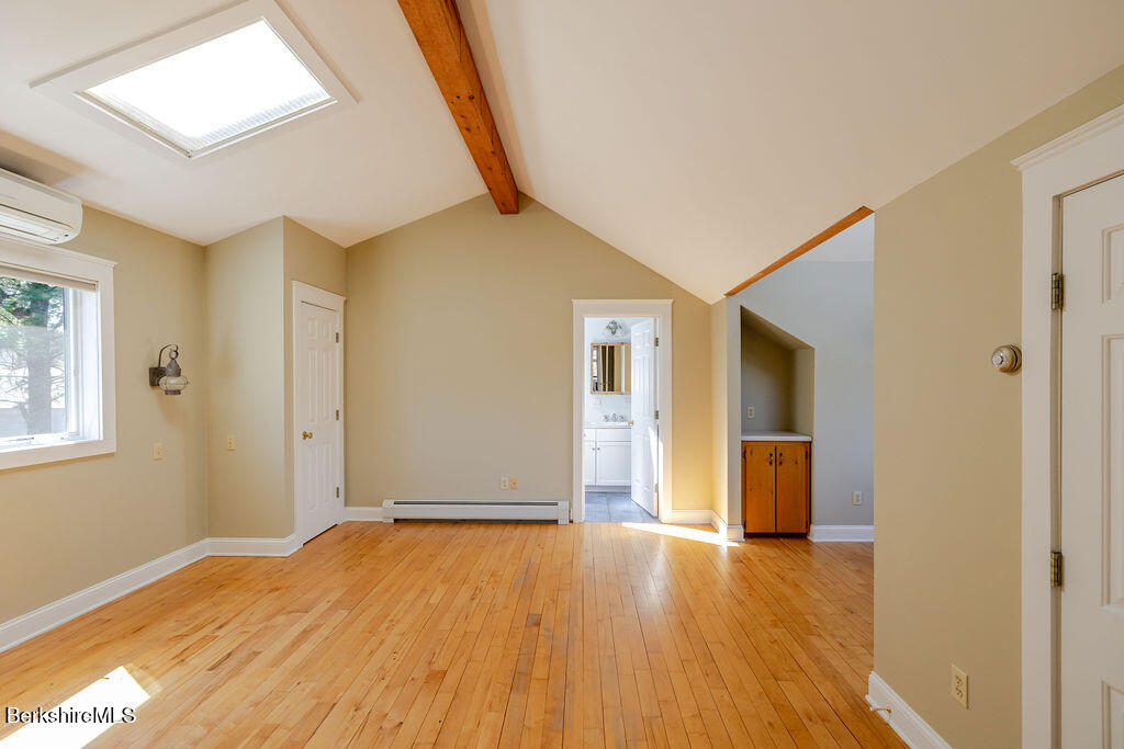 3 Townhouse Hill Road Egremont, MA 01230 - Photo 22 of 39 a view of empty room with wooden floor and fan