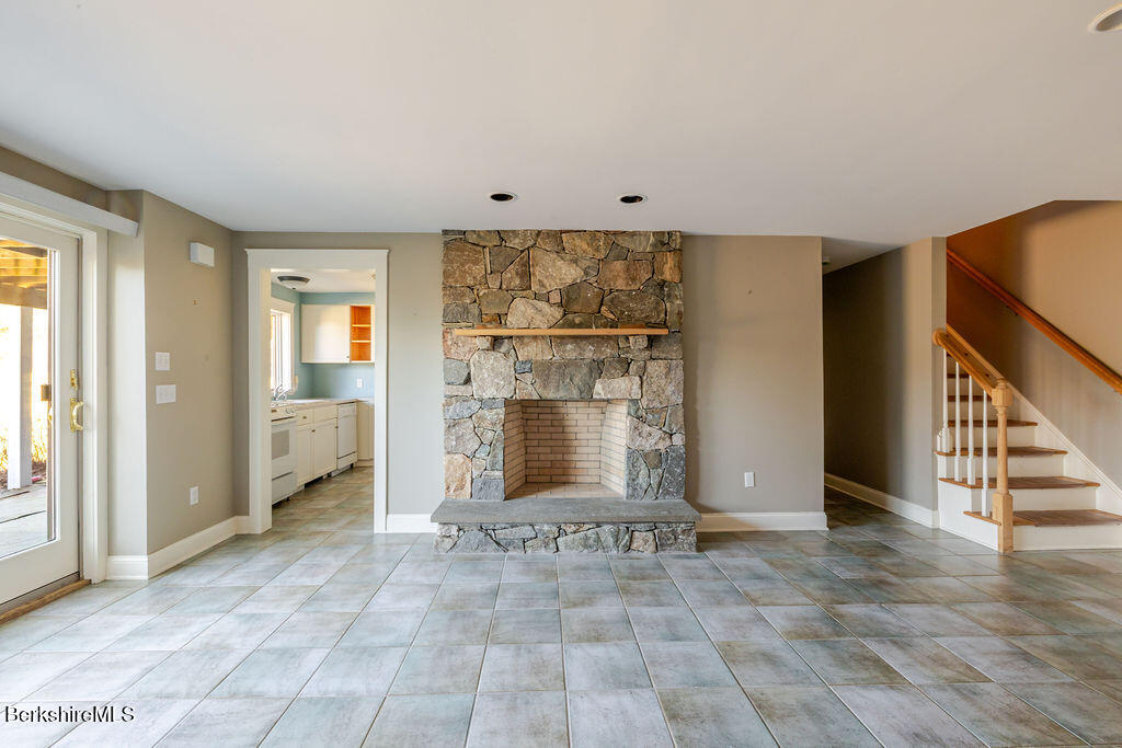 3 Townhouse Hill Road Egremont, MA 01230 - Photo 30 of 39 a view of an empty room with a fireplace