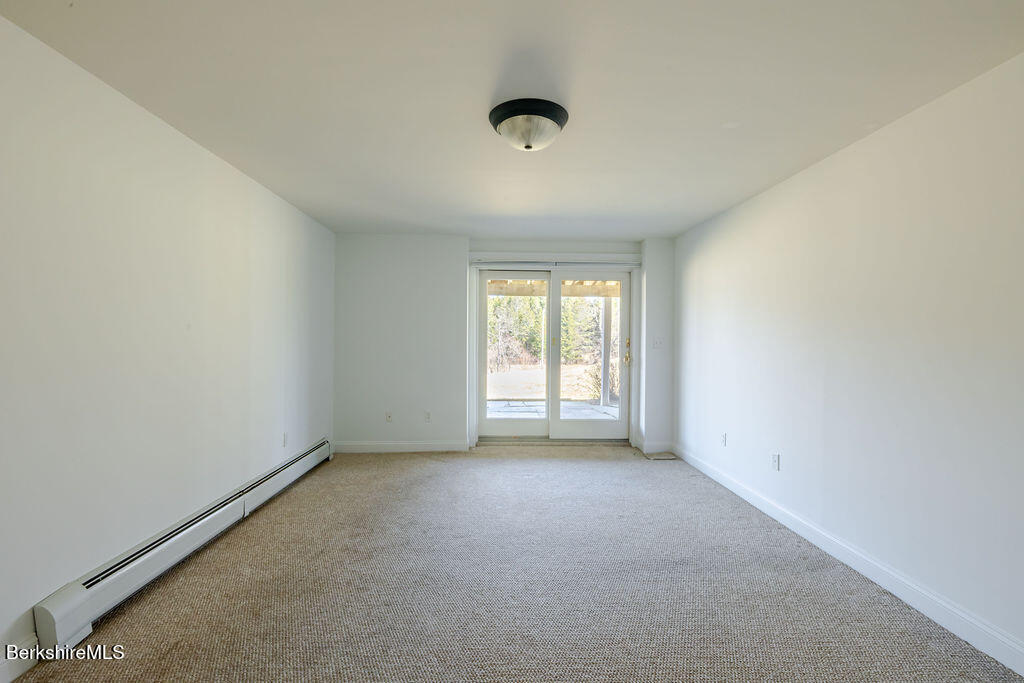 3 Townhouse Hill Road Egremont, MA 01230 - Photo 34 of 39 an empty room with a empty space and windows