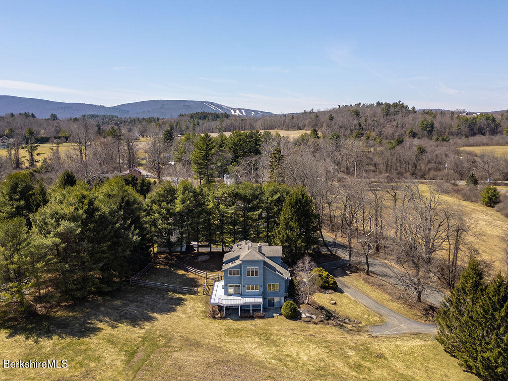 3 Townhouse Hill Road Egremont, MA 01230 - Photo 38 of 39 a view of a town with mountains in the background