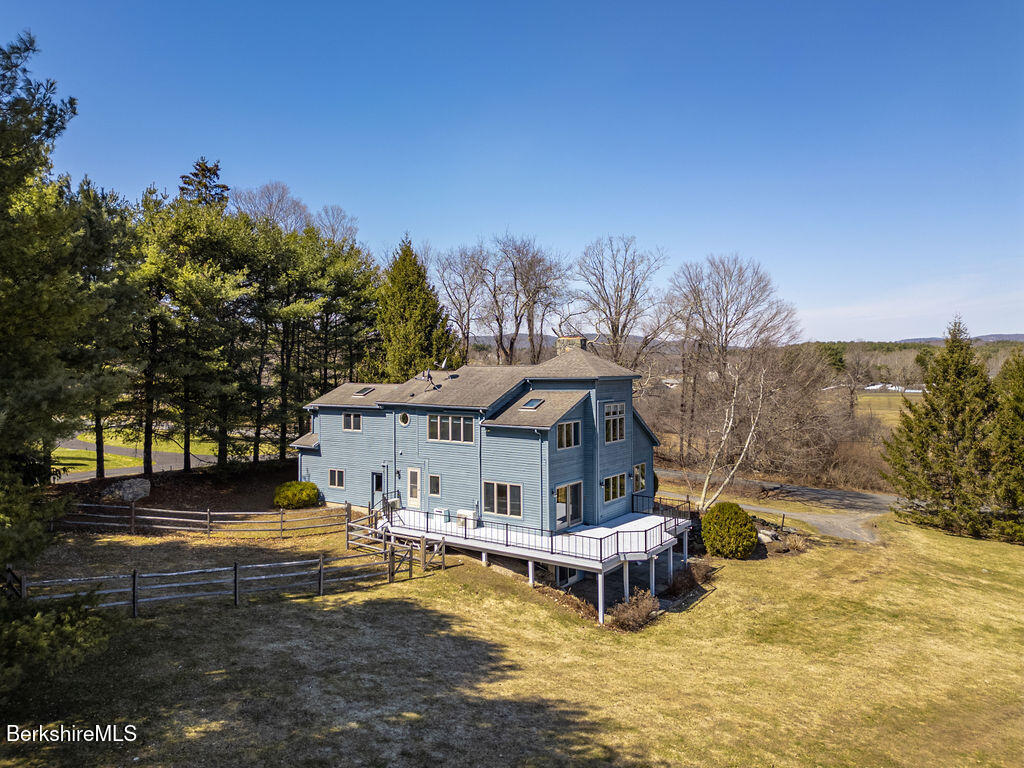 3 Townhouse Hill Road Egremont, MA 01230 - Photo 4 of 39 a swimming pool is sitting in the middle of a house