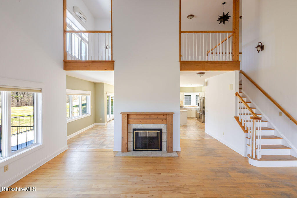 3 Townhouse Hill Road Egremont, MA 01230 - Photo 6 of 39 a view of an empty room with wooden floor and a window