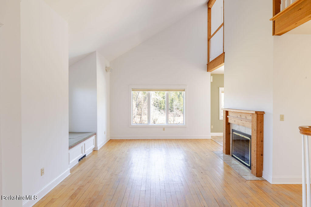3 Townhouse Hill Road Egremont, MA 01230 - Photo 7 of 39 a view of an empty room with a window and wooden floor