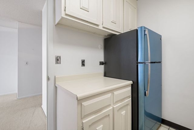 a utility room with washer and dryer