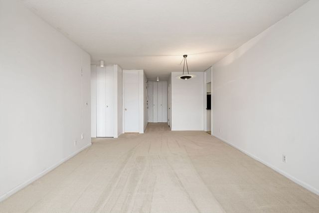 an empty room with a natural light