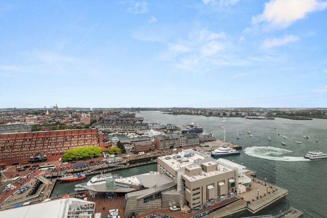 a view of a city and lake