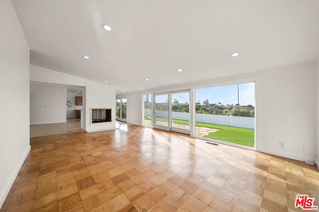 27041 Whitestone Road Rancho Palos Verdes, CA 90275 - Photo 4 of 23 a view of an empty room with a stove and kitchen view