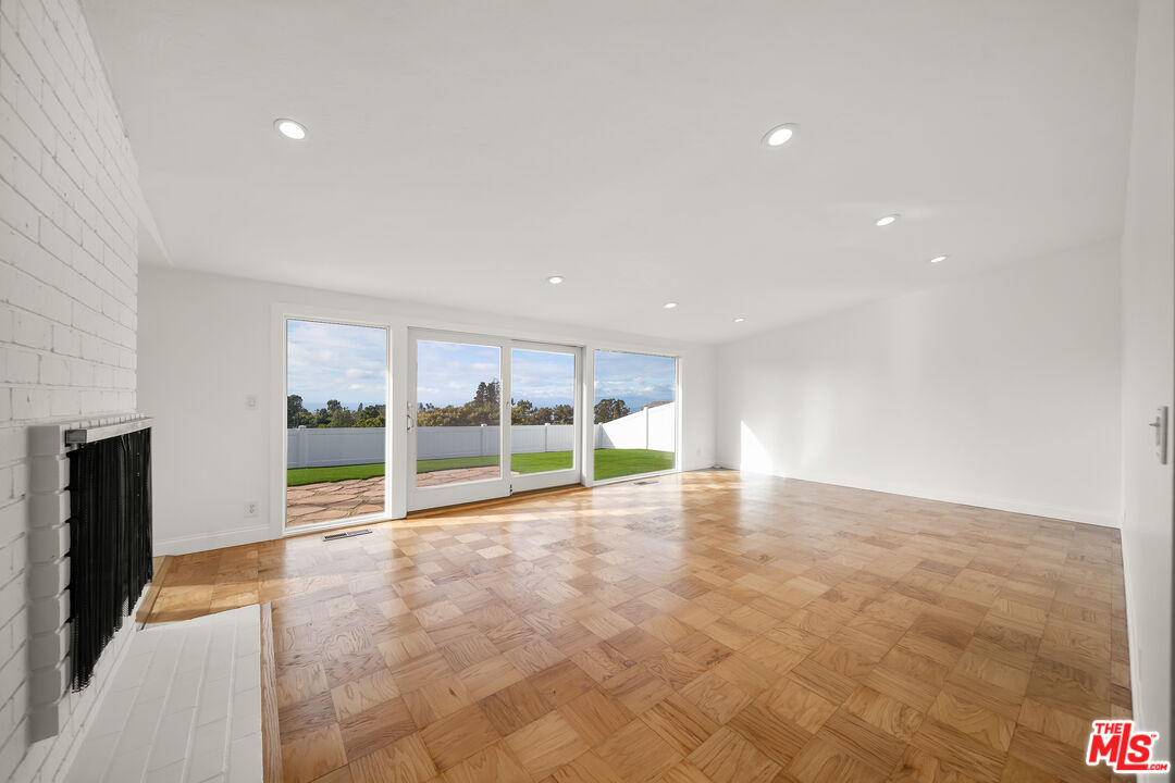27041 Whitestone Road Rancho Palos Verdes, CA 90275 - Photo 5 of 23 a view of an empty room with glass door