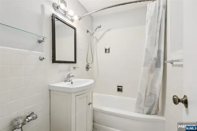 a kitchen with appliances and cabinets