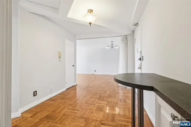 a view of a room that has a large window