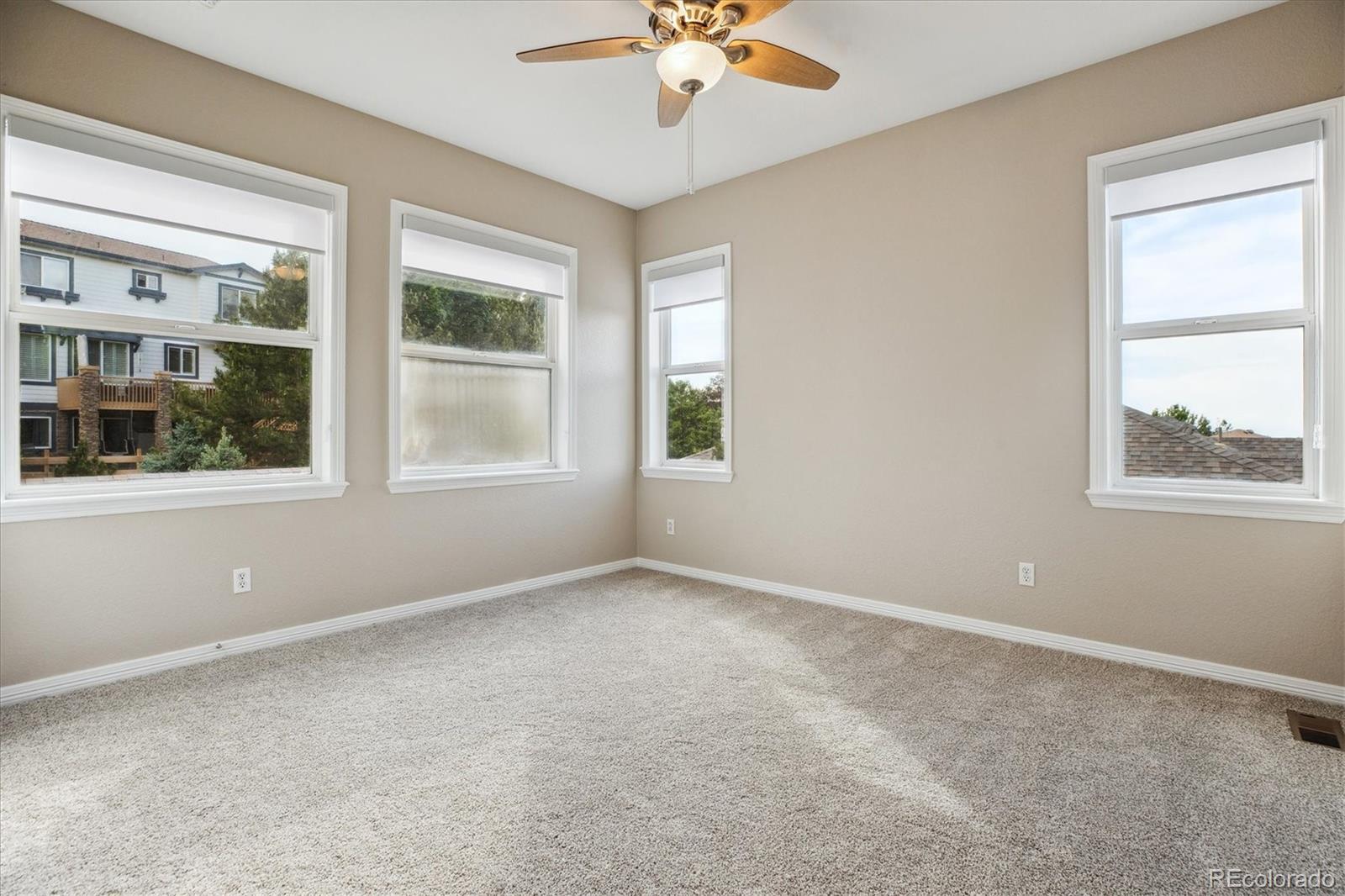 2601 Pemberly Avenue Highlands Ranch, CO 80126 - Photo 27 of 38 a view of an empty room with a window