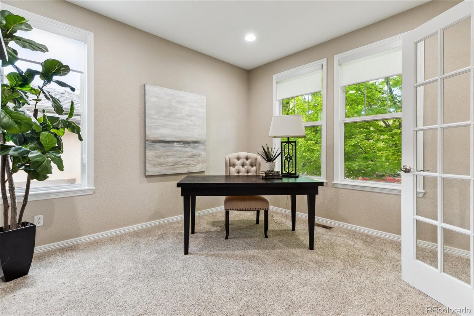 2601 Pemberly Avenue Highlands Ranch, CO 80126 - Photo 4 of 38 a workspace with furniture and a window