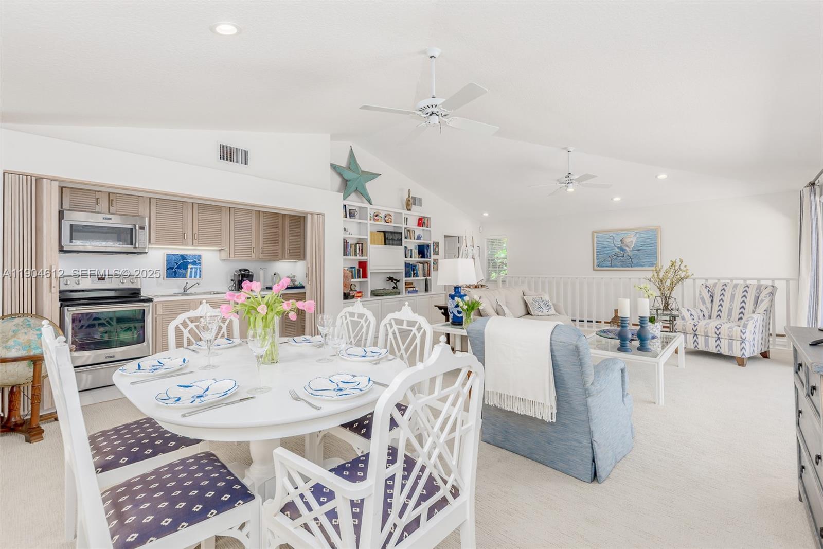 247 South Beach Road Jupiter Island, FL 33455 - Photo 19 of 71 a view of a dining room with furniture