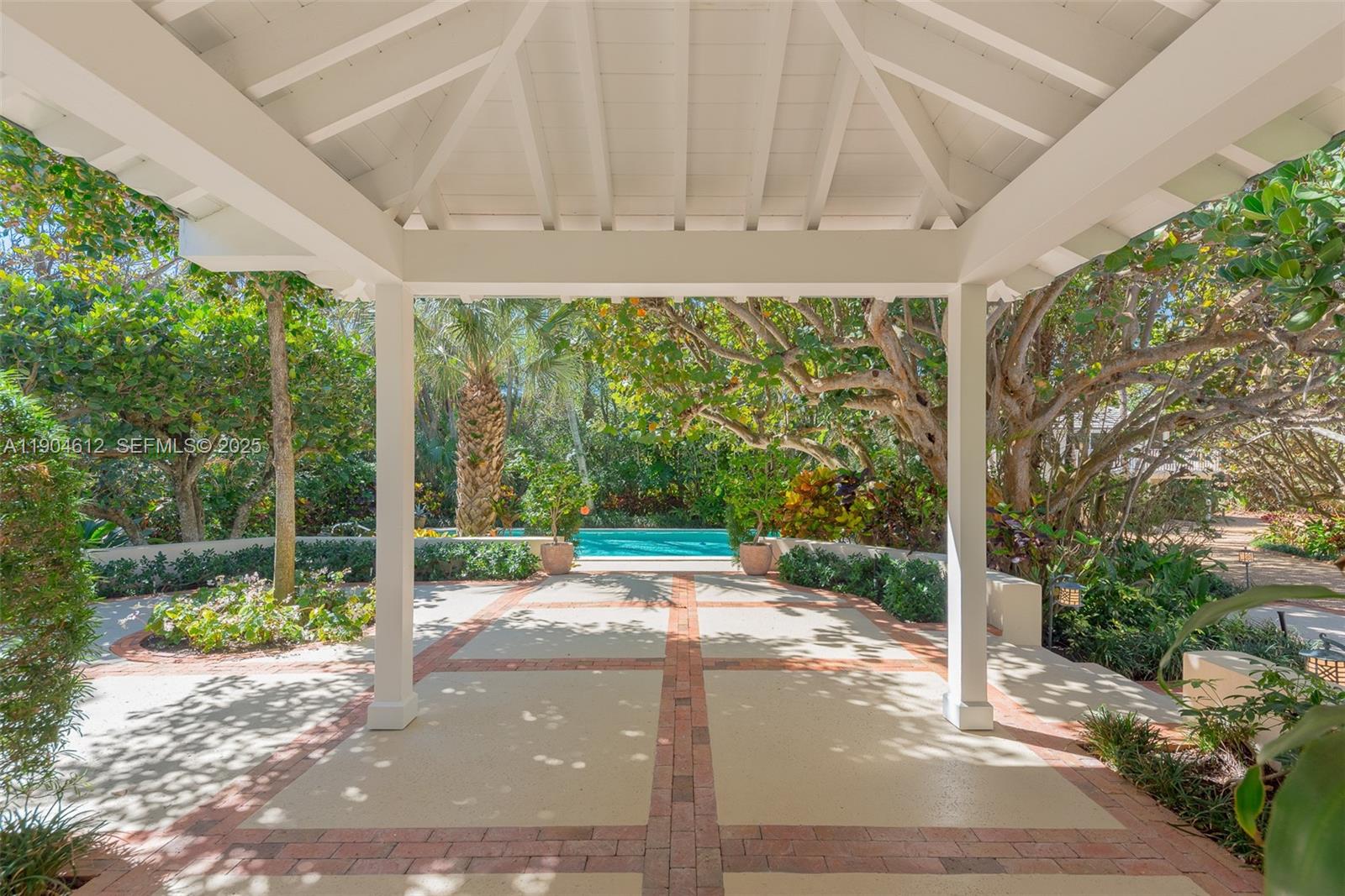 247 South Beach Road Jupiter Island, FL 33455 - Photo 25 of 71 a view of a back yard with green space