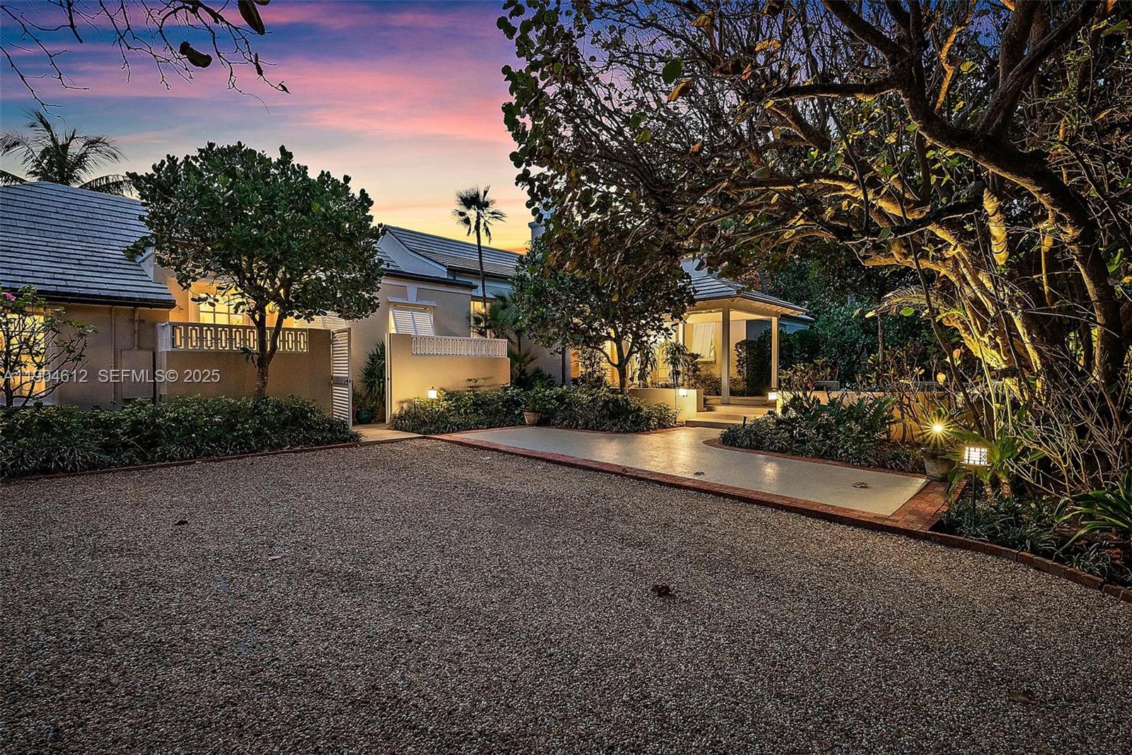 247 South Beach Road Jupiter Island, FL 33455 - Photo 50 of 71 a view of a house with a street