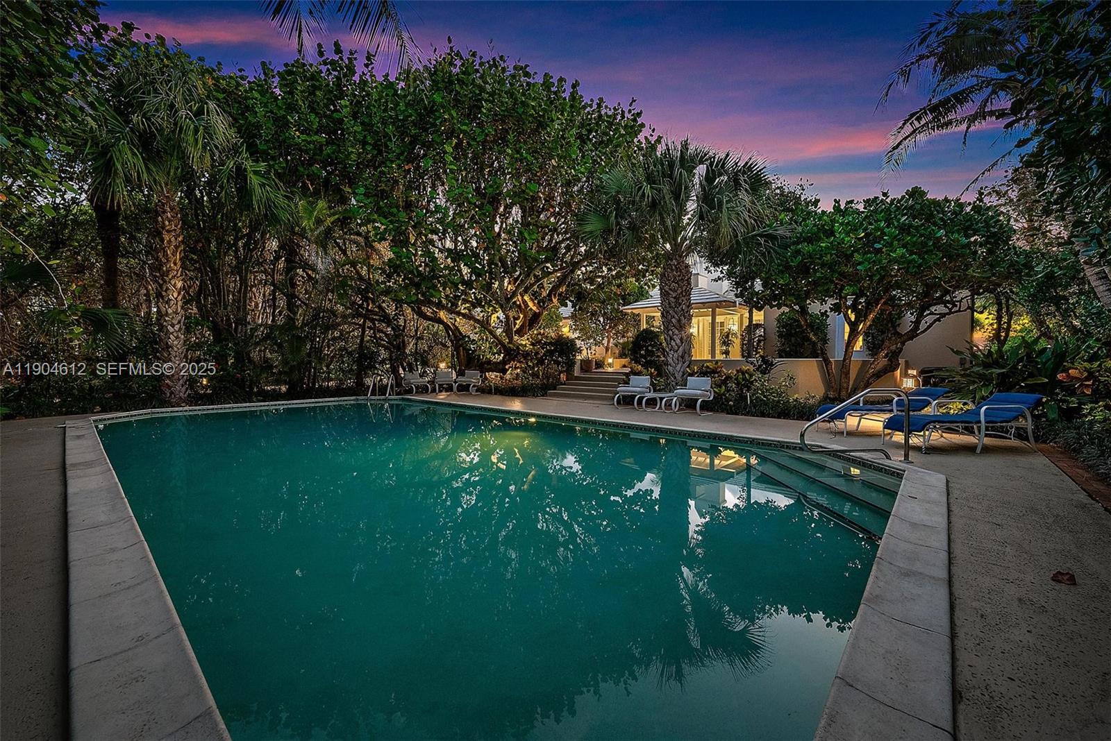 247 South Beach Road Jupiter Island, FL 33455 - Photo 53 of 71 a view of a lake with a yard