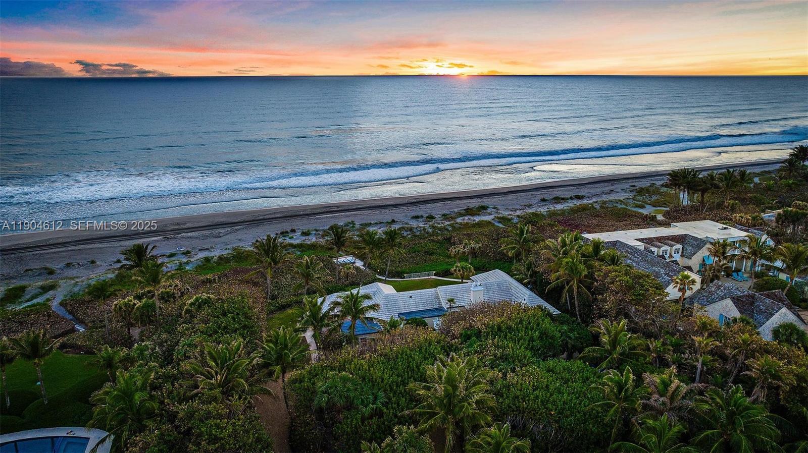 247 South Beach Road Jupiter Island, FL 33455 - Photo 67 of 71 a backyard of a house with lots of green space