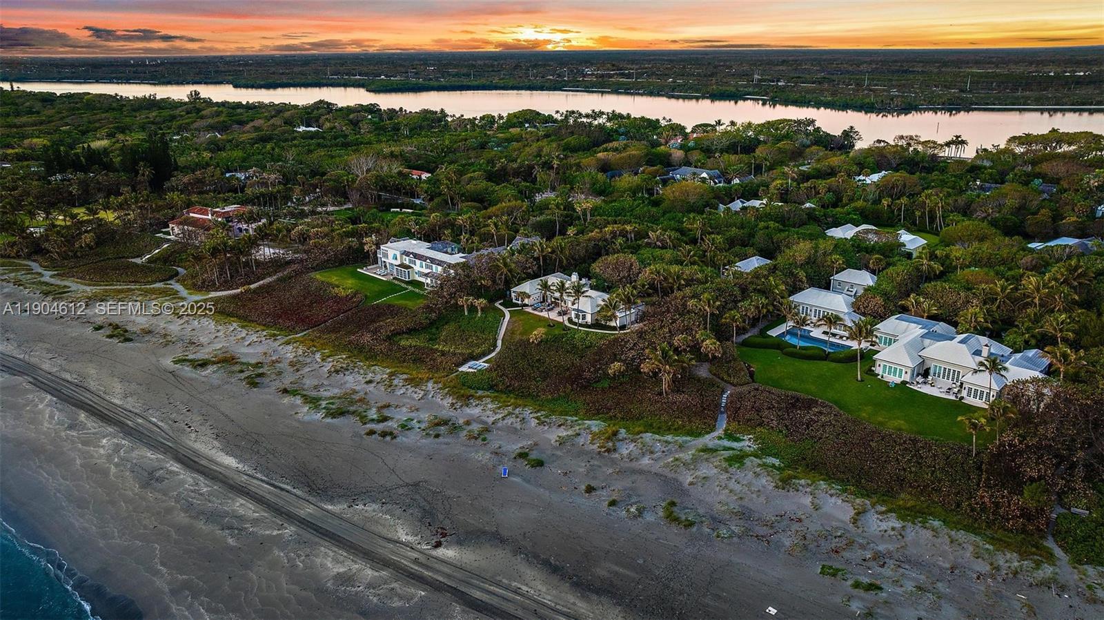 247 South Beach Road Jupiter Island, FL 33455 - Photo 68 of 71 a view of a city with a mountain