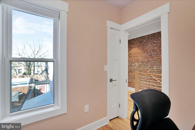 a view of a chair and table in a room