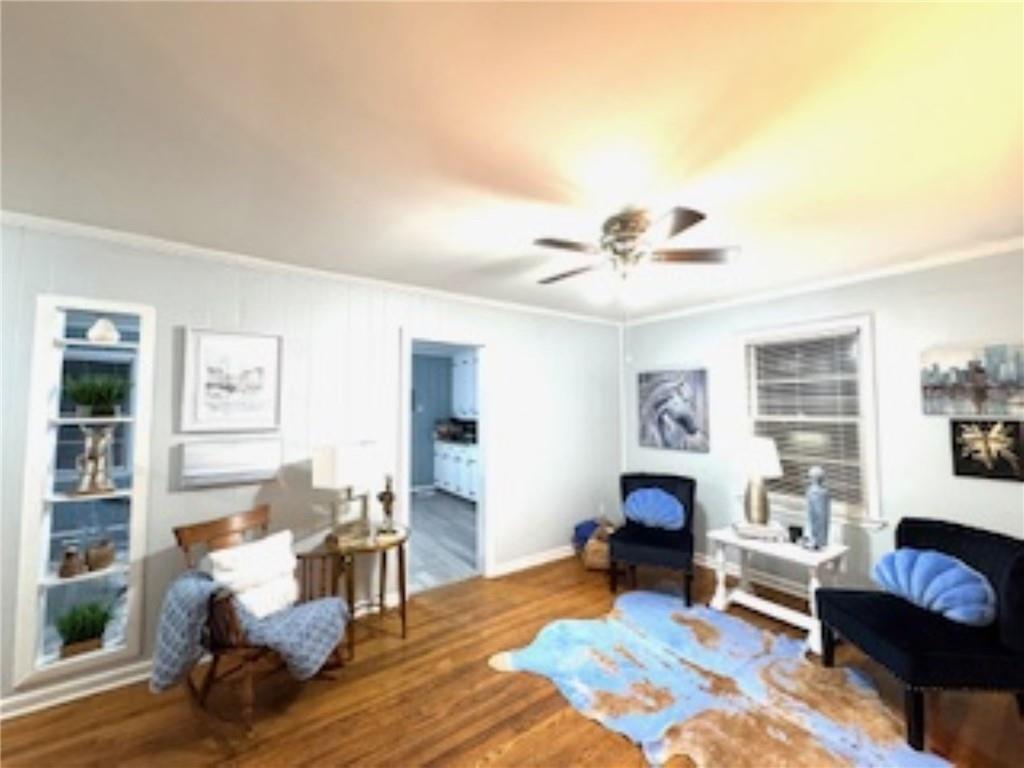 209 Moultrie Lane Southwest Rome, GA 30161 - Photo 18 of 49 a living room with furniture and a fireplace
