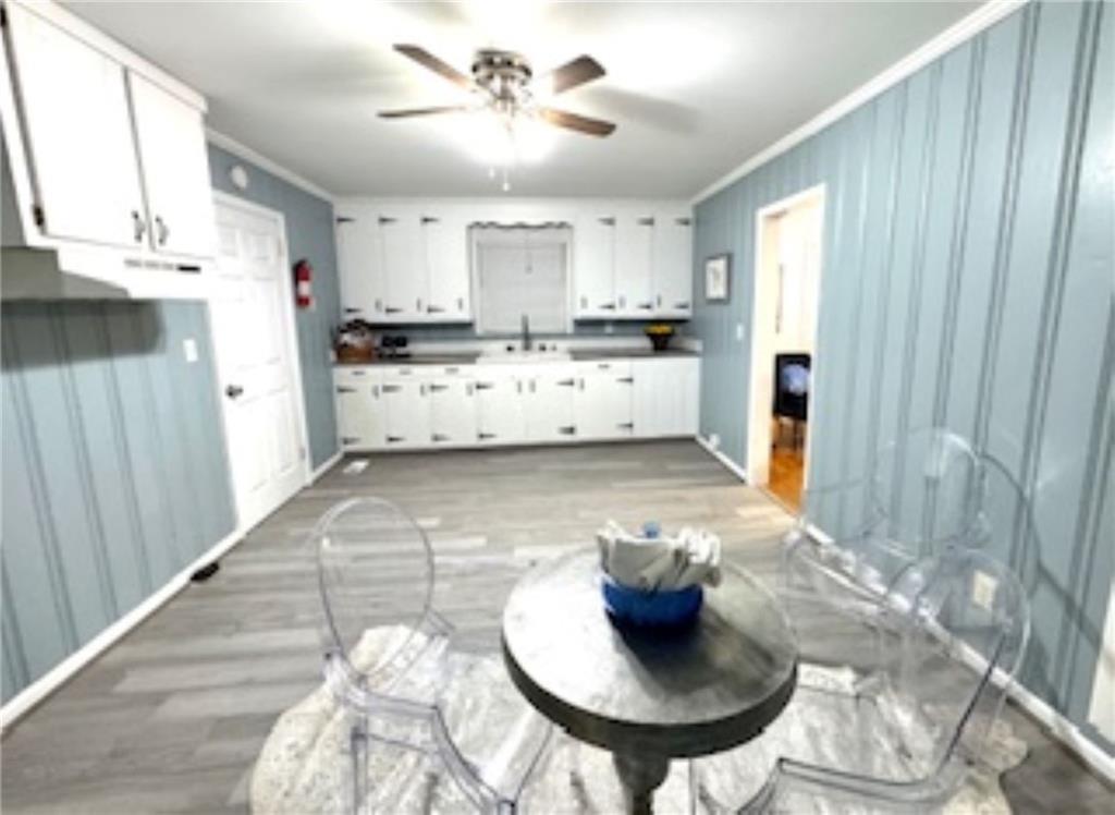209 Moultrie Lane Southwest Rome, GA 30161 - Photo 26 of 49 a kitchen with stainless steel appliances kitchen island granite countertop a sink and a refrigerator