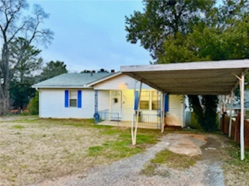 209 Moultrie Lane Southwest Rome, GA 30161 - Photo 3 of 49 a view of a house with a yard