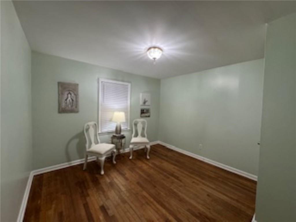 209 Moultrie Lane Southwest Rome, GA 30161 - Photo 43 of 49 a living room with furniture and a wooden floor