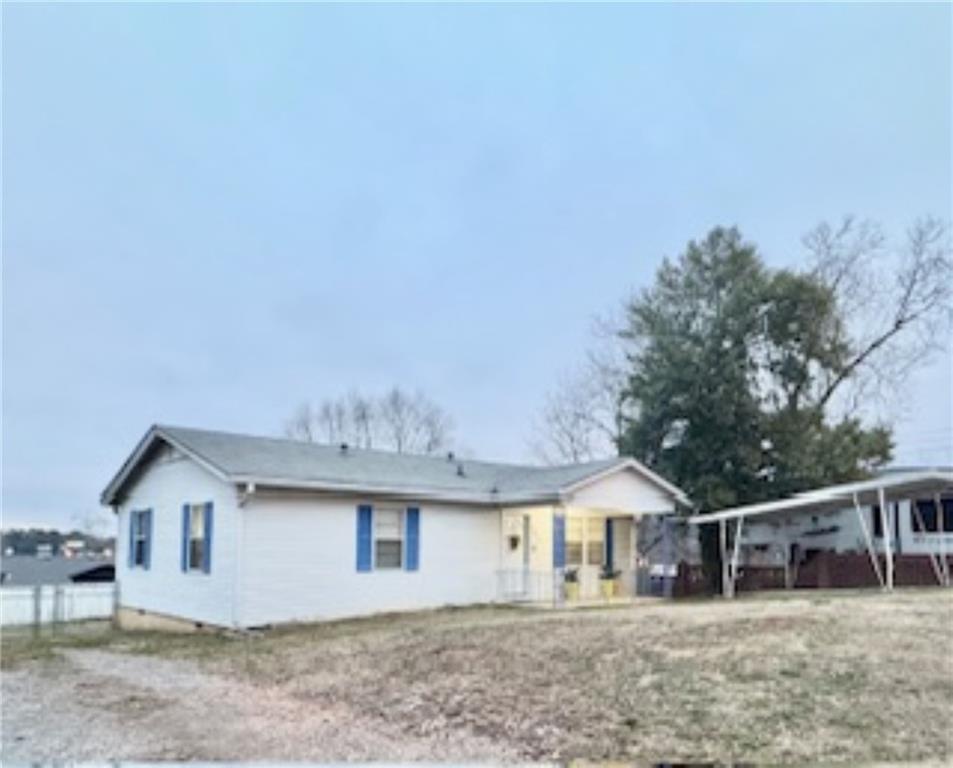 209 Moultrie Lane Southwest Rome, GA 30161 - Photo 6 of 49 a view of a house with a backyard and balcony
