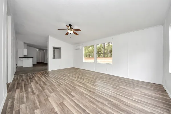 an empty room with windows