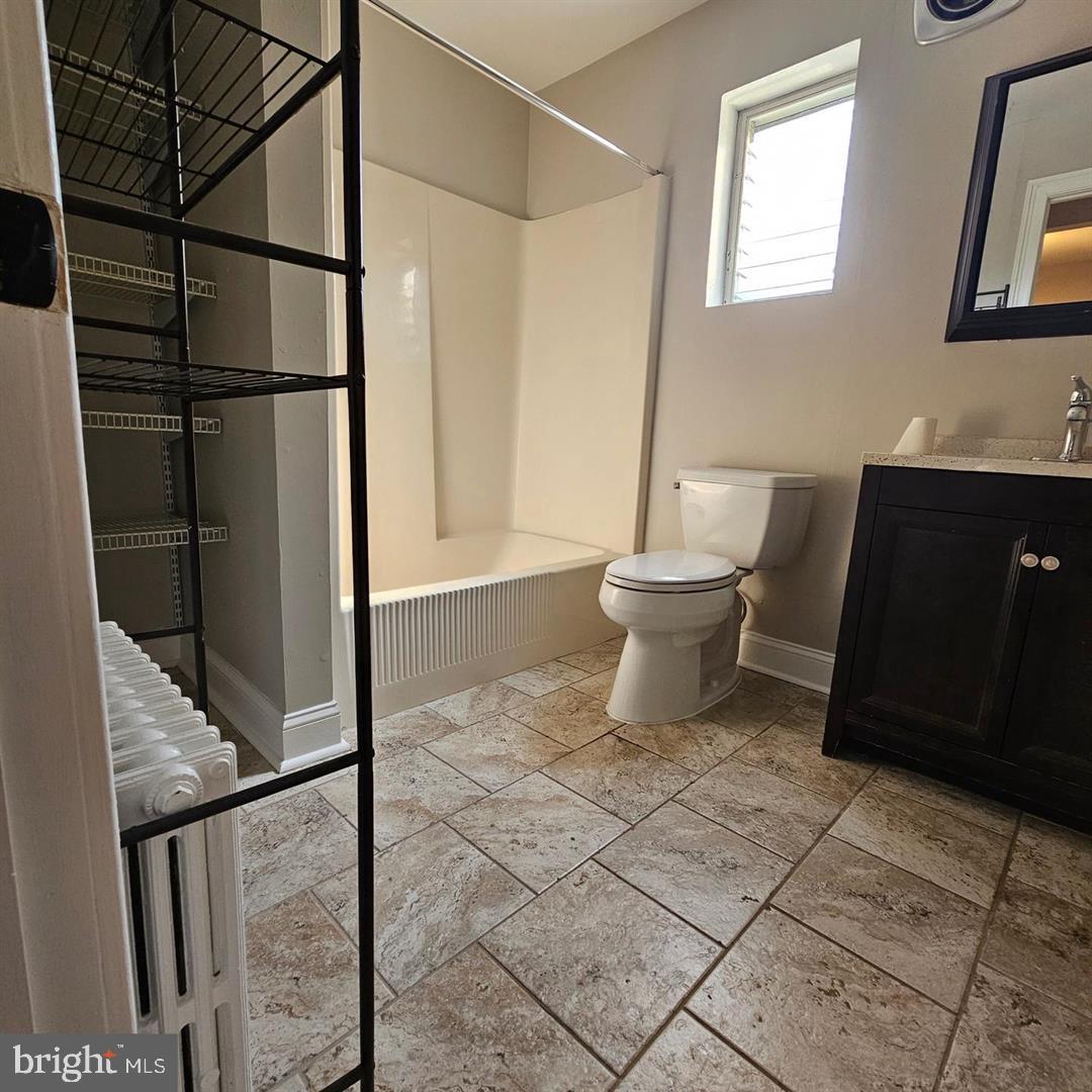 2635 Nottingham Way, Unit 1 Hamilton, NJ 08619 - Photo 6 of 10 Modern bathroom with elegant tiles.