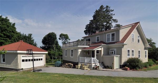 5 Highland Road Tiverton, RI 02878 - Photo 26 of 26 a front view of a house with a yard