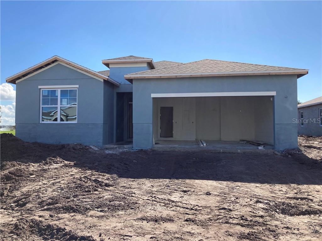 1956 Partin Terrace Road Kissimmee, FL 34744 - Photo 1 of 1 a front view of a house
