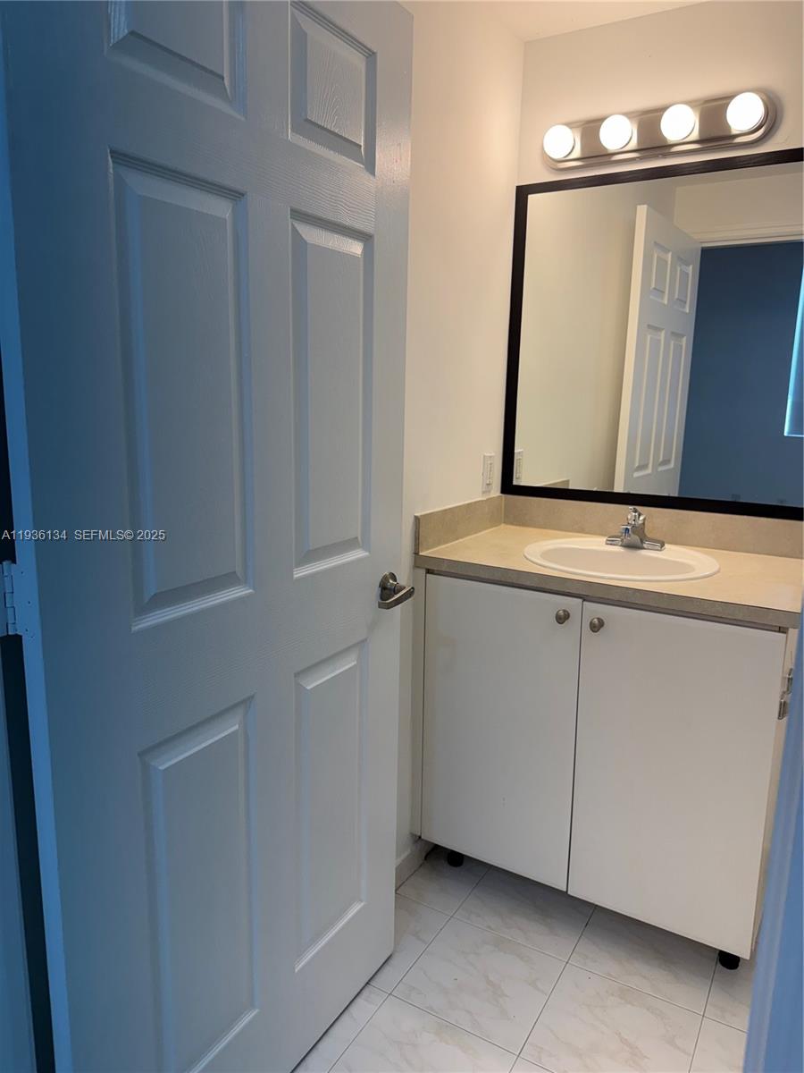 119 Southwest 6th Avenue, Unit 606 Miami, FL 33130 - Photo 9 of 20 a view of cabinets