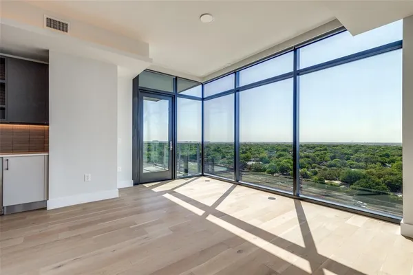 a view of a room with a large window