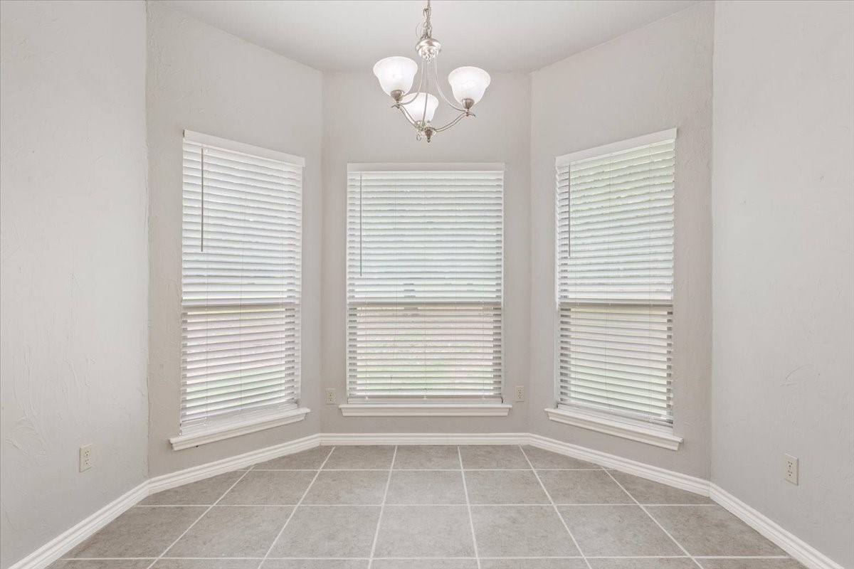 140 Oak Ridge Loop Whitney, TX 76692 - Photo 12 of 40 a view of an empty room with a window