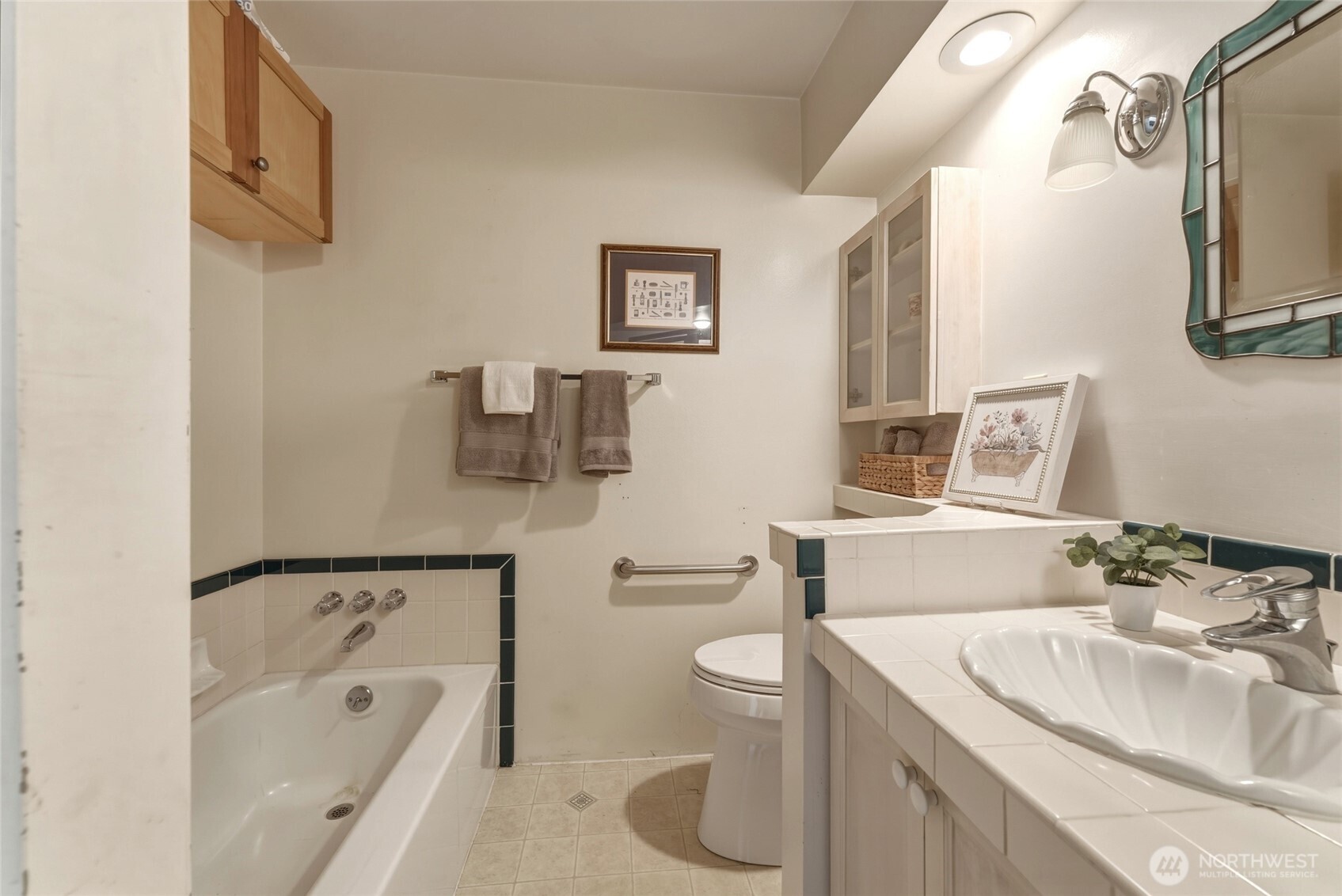 5834 Russell Creek Road Walla Walla, WA 99362 - Photo 19 of 38 a bathroom with a granite countertop sink toilet and shower