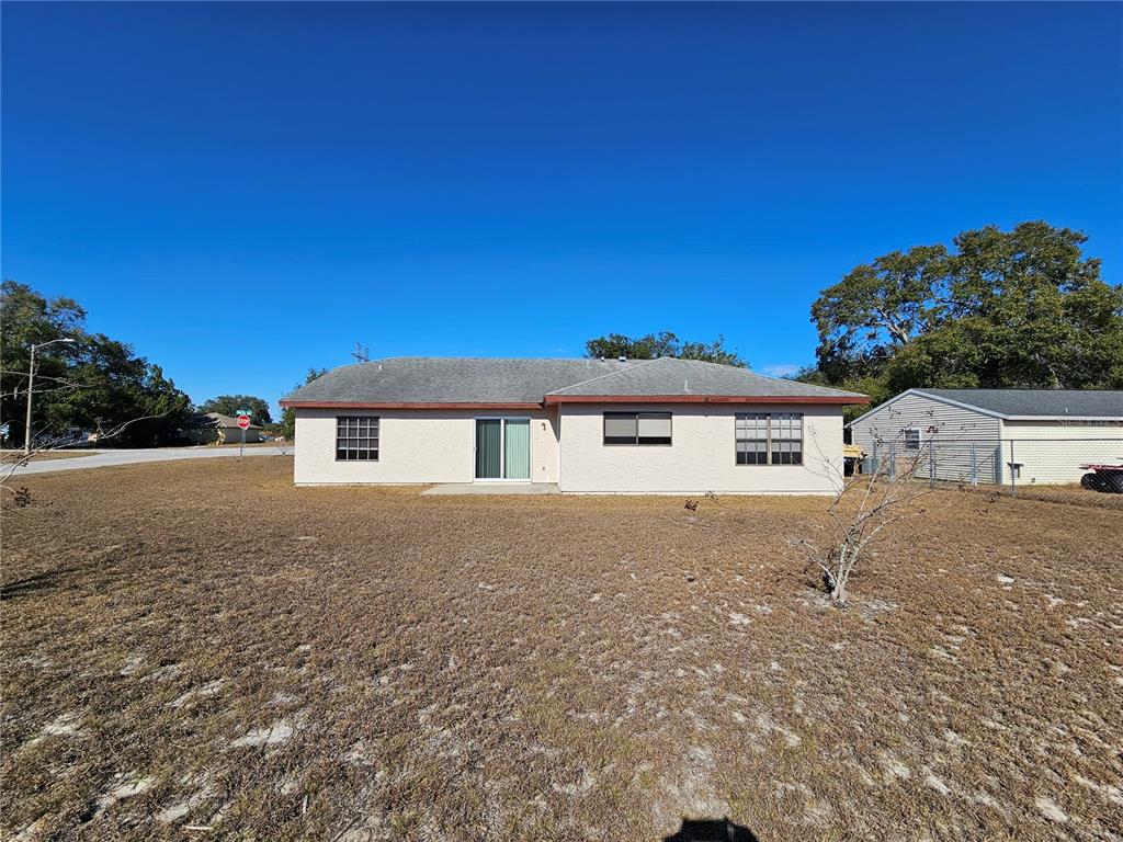 312 Oak Track Pass Ocala, FL 34472 - Photo 17 of 17 a house view with a outdoor space