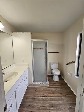 a bathroom with a sink and a large mirror