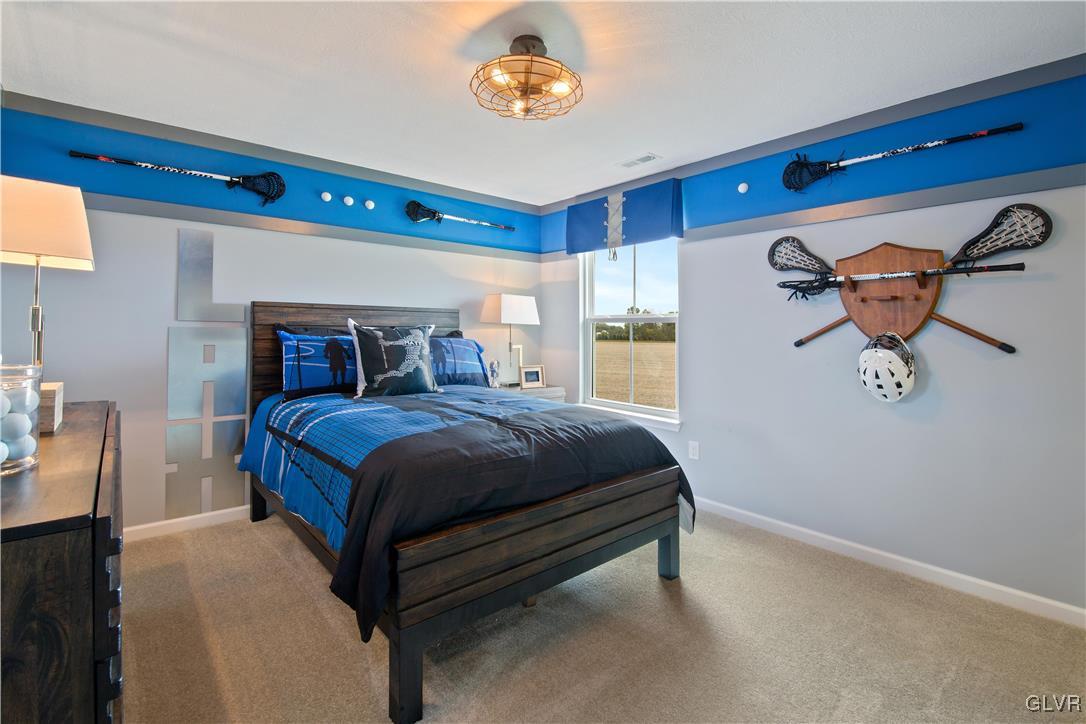 2875 10th Street Bethlehem, PA 18020 - Photo 12 of 15 a bedroom with a bed and window