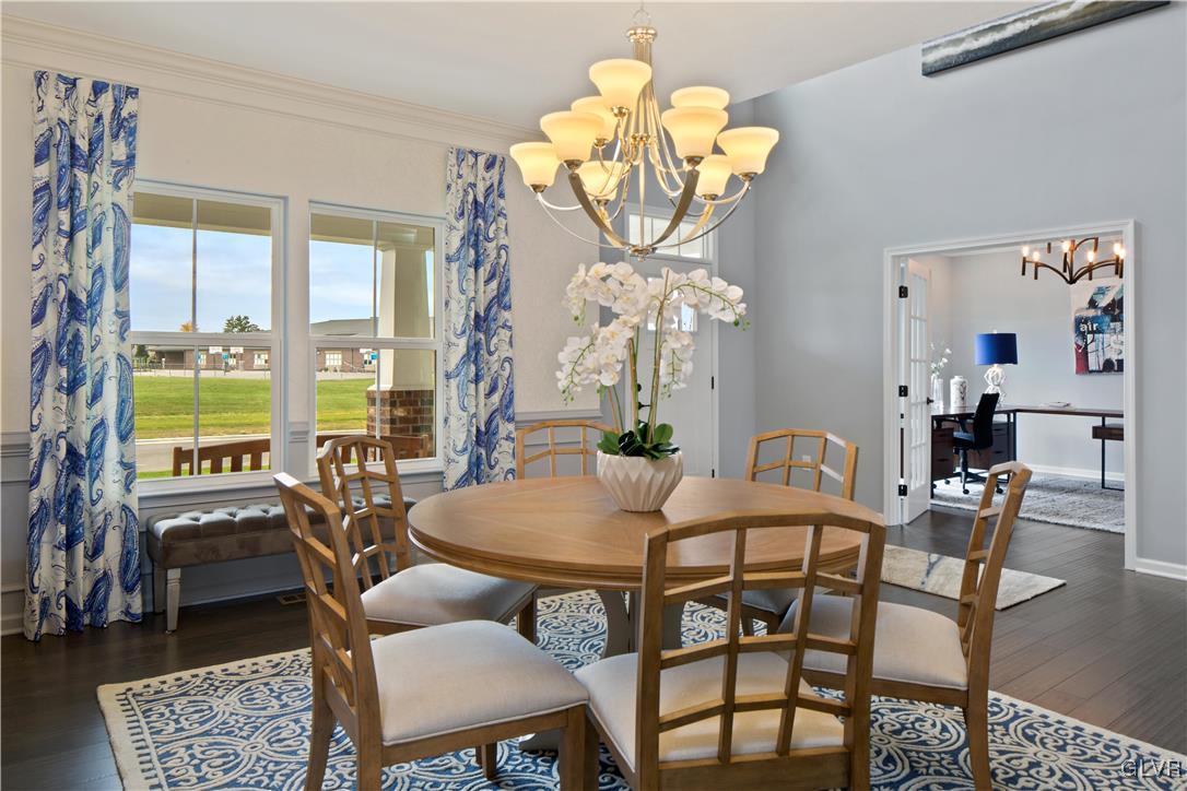 2875 10th Street Bethlehem, PA 18020 - Photo 5 of 15 a view of a dining room with furniture a chandelier and a window