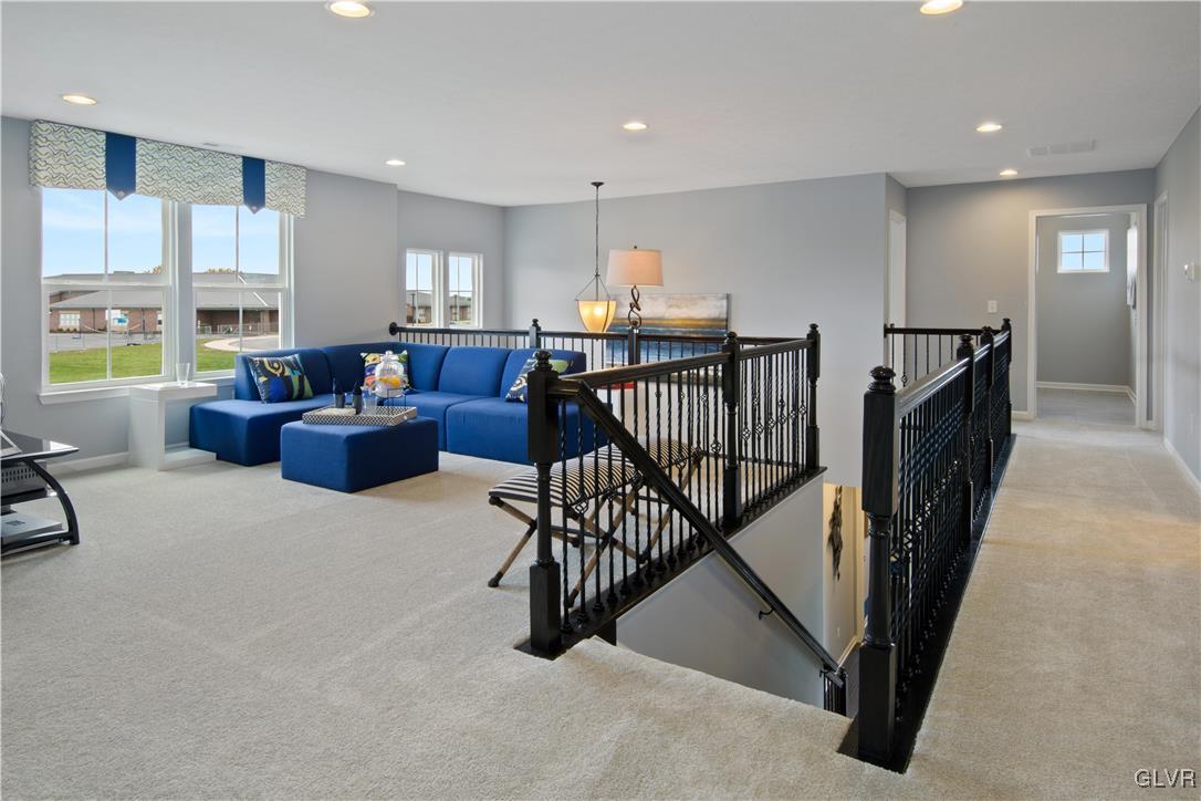 2875 10th Street Bethlehem, PA 18020 - Photo 7 of 15 a living room with furniture windows and a flat screen tv