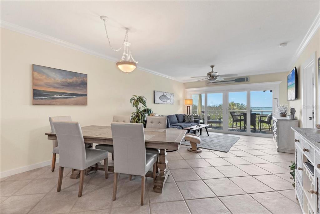 11000 Placida Road, Unit 302 Placida, FL 33946 - Photo 17 of 48 a view of a dining room with furniture